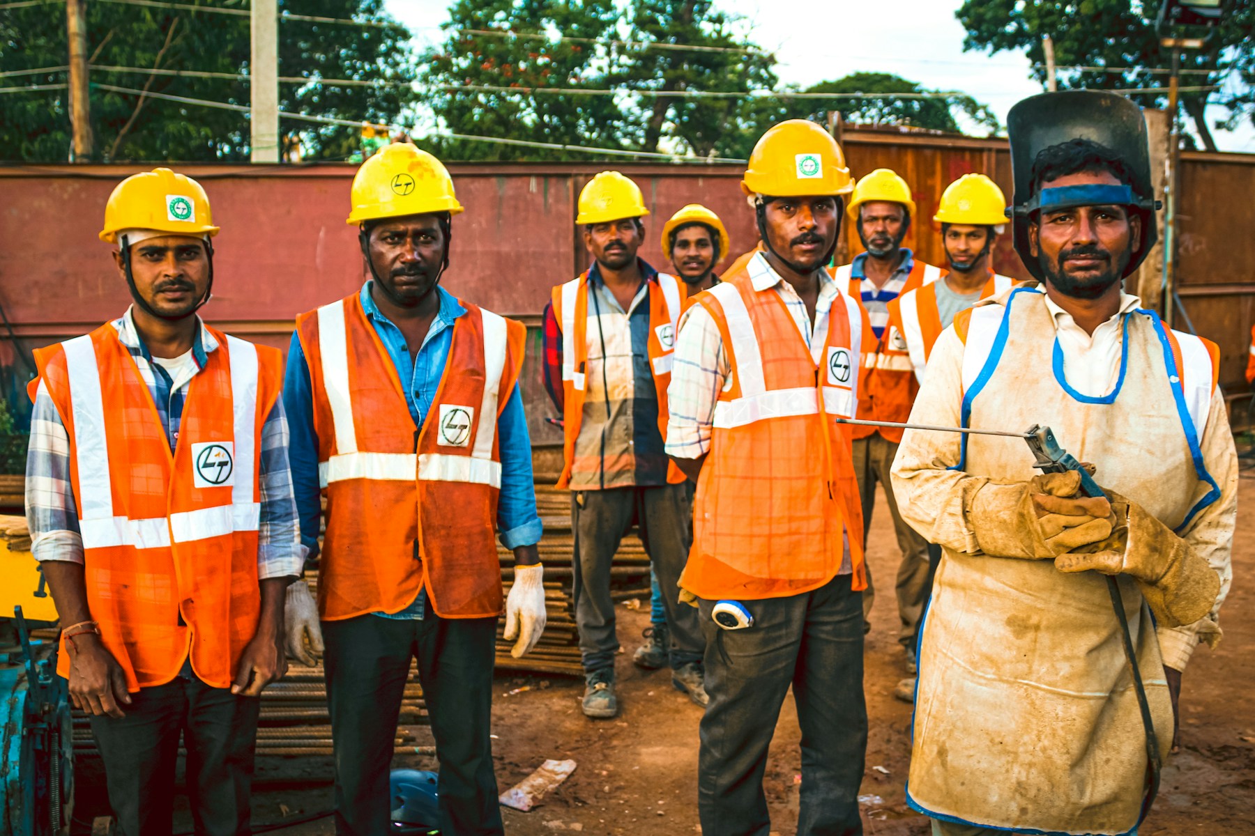 Field workers in reflective vests
