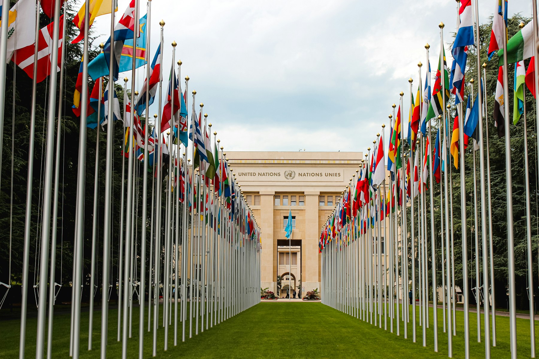 Member-state flags flying outside the Palais des Nations in Geneva